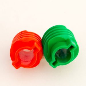 Red and Green custom moulded plastic components by Roland Plastics